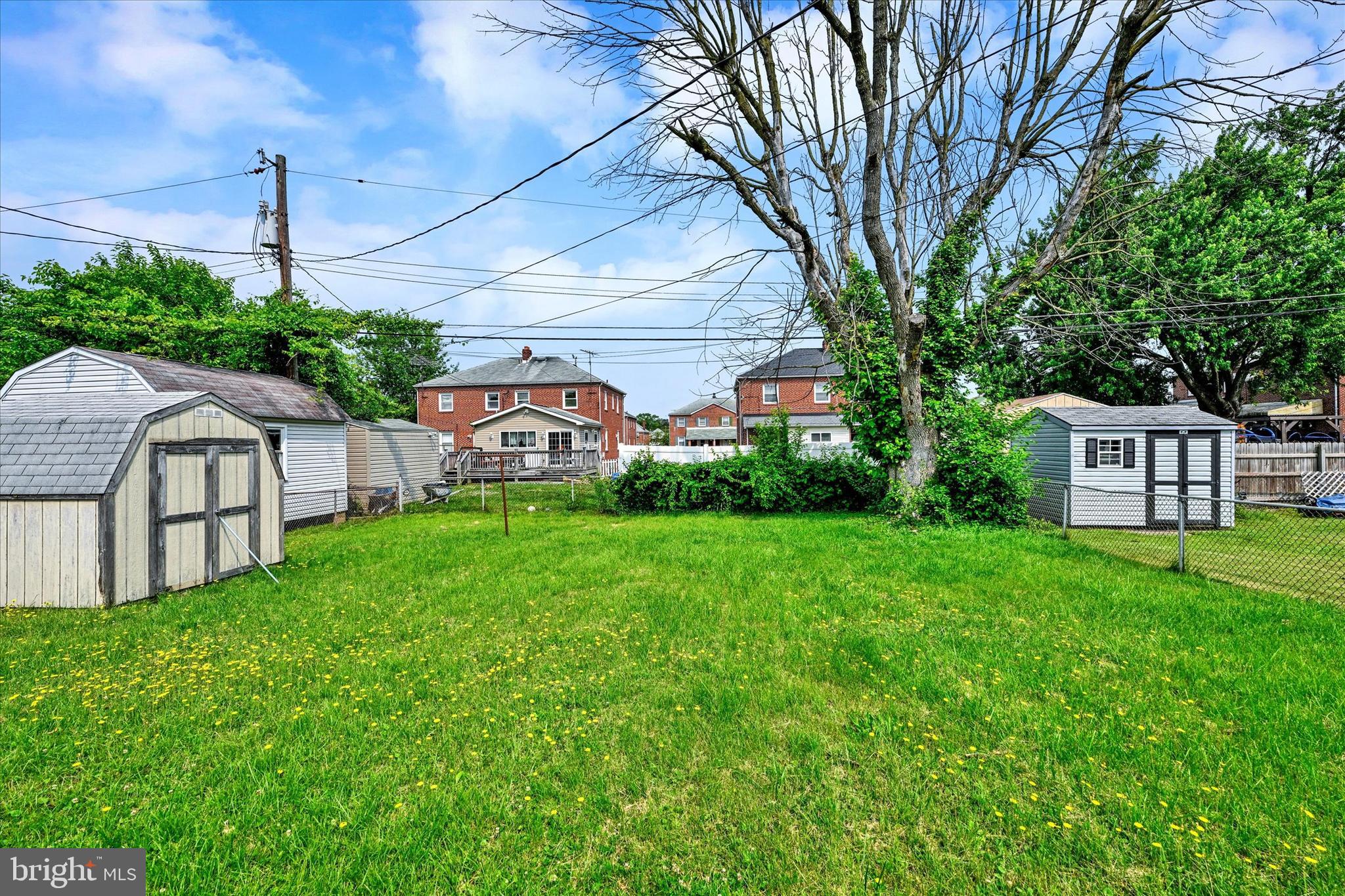6820 Bessemer Avenue Baltimore, MD 21222 - Photo 16 of 17 a view of a house with backyard and garden