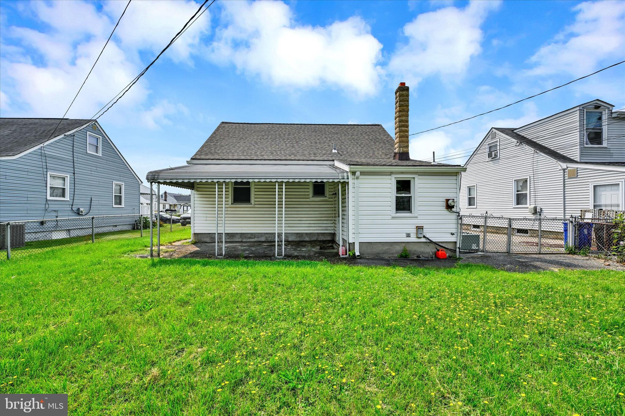 6820 Bessemer Avenue Baltimore, MD 21222 - Photo 17 of 17 a view of a house with a backyard