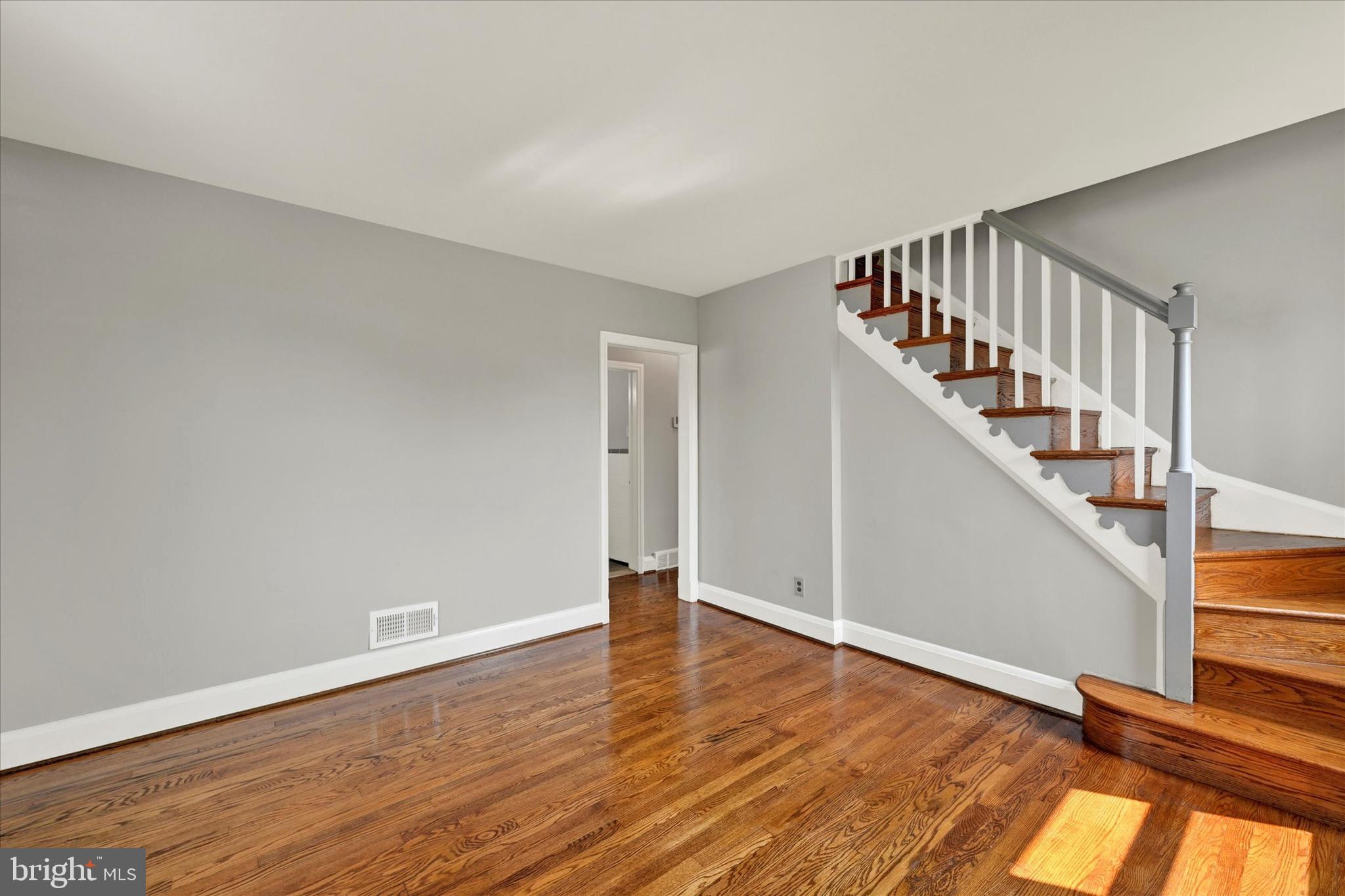 6820 Bessemer Avenue Baltimore, MD 21222 - Photo 4 of 17 a view of entryway with wooden floor
