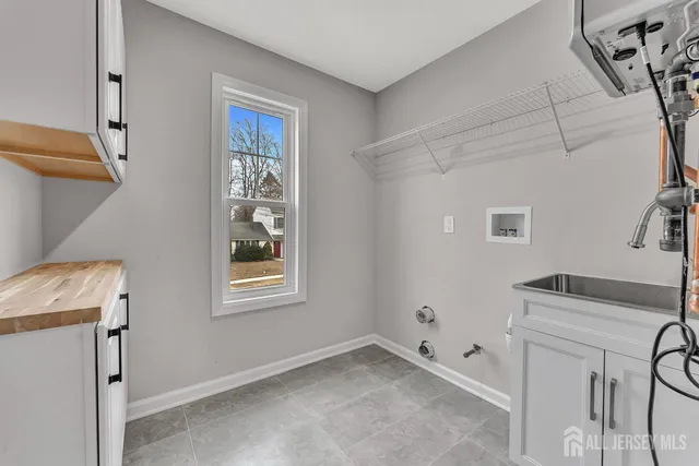 a room with window and furniture