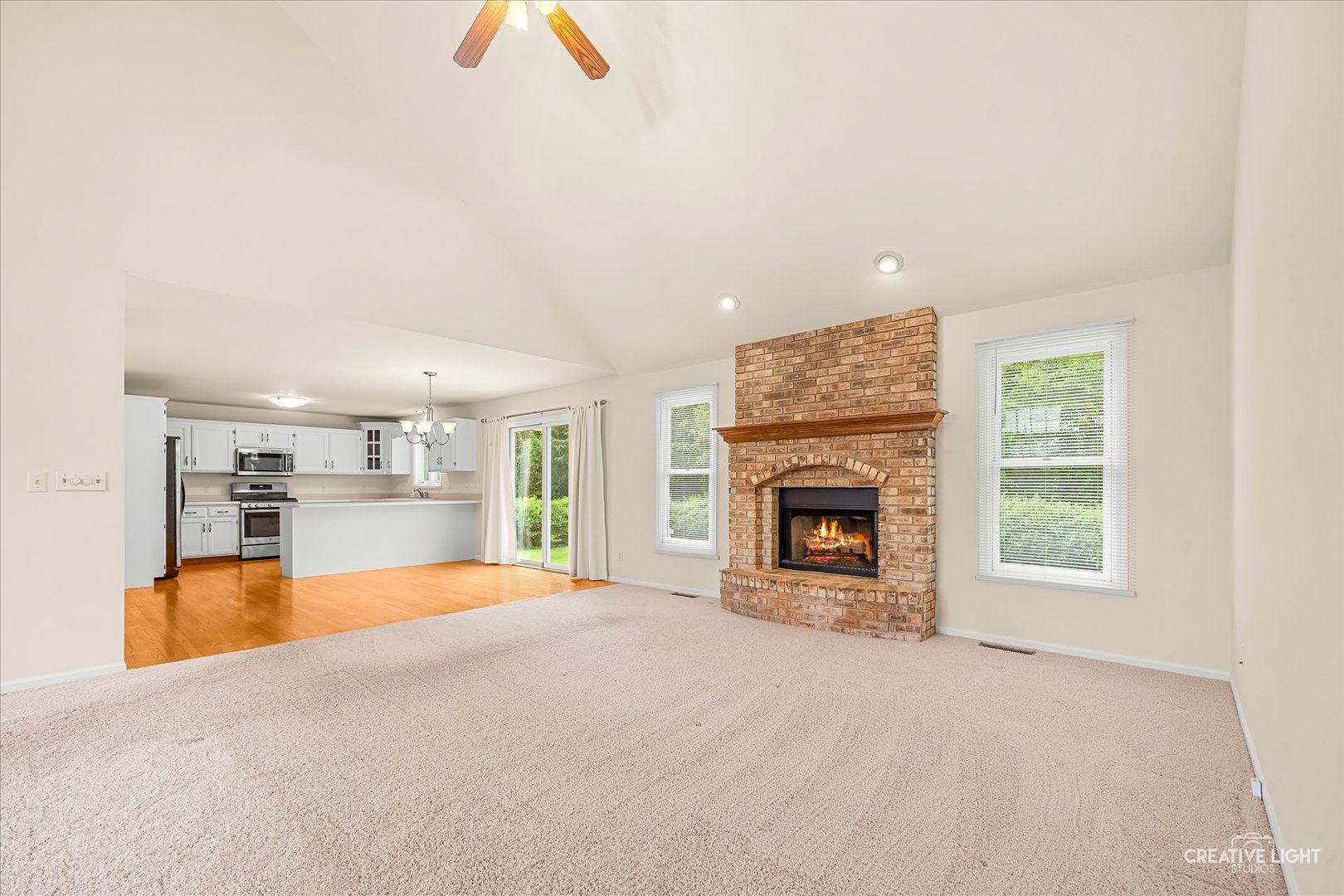 714 East Knights Road Sandwich, IL 60548 - Photo 4 of 33 a view of a livingroom with a fireplace and window