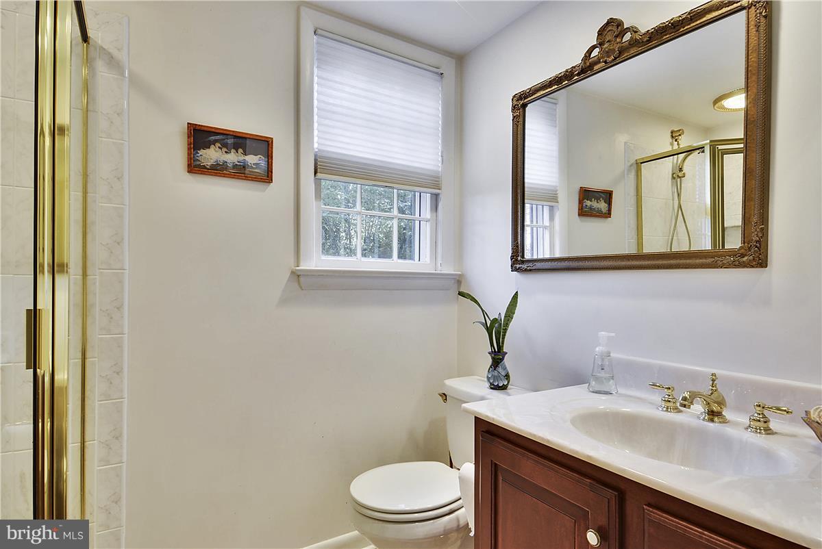 2433 Hunter Mill Road Vienna, VA 22181 - Photo 22 of 30 Full bath on lower level between two bedrooms