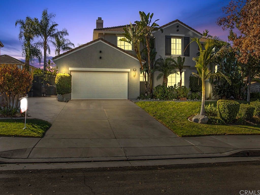 8449 Sunshine Lane Riverside, CA 92508 - Photo 1 of 1 a front view of a house with garden