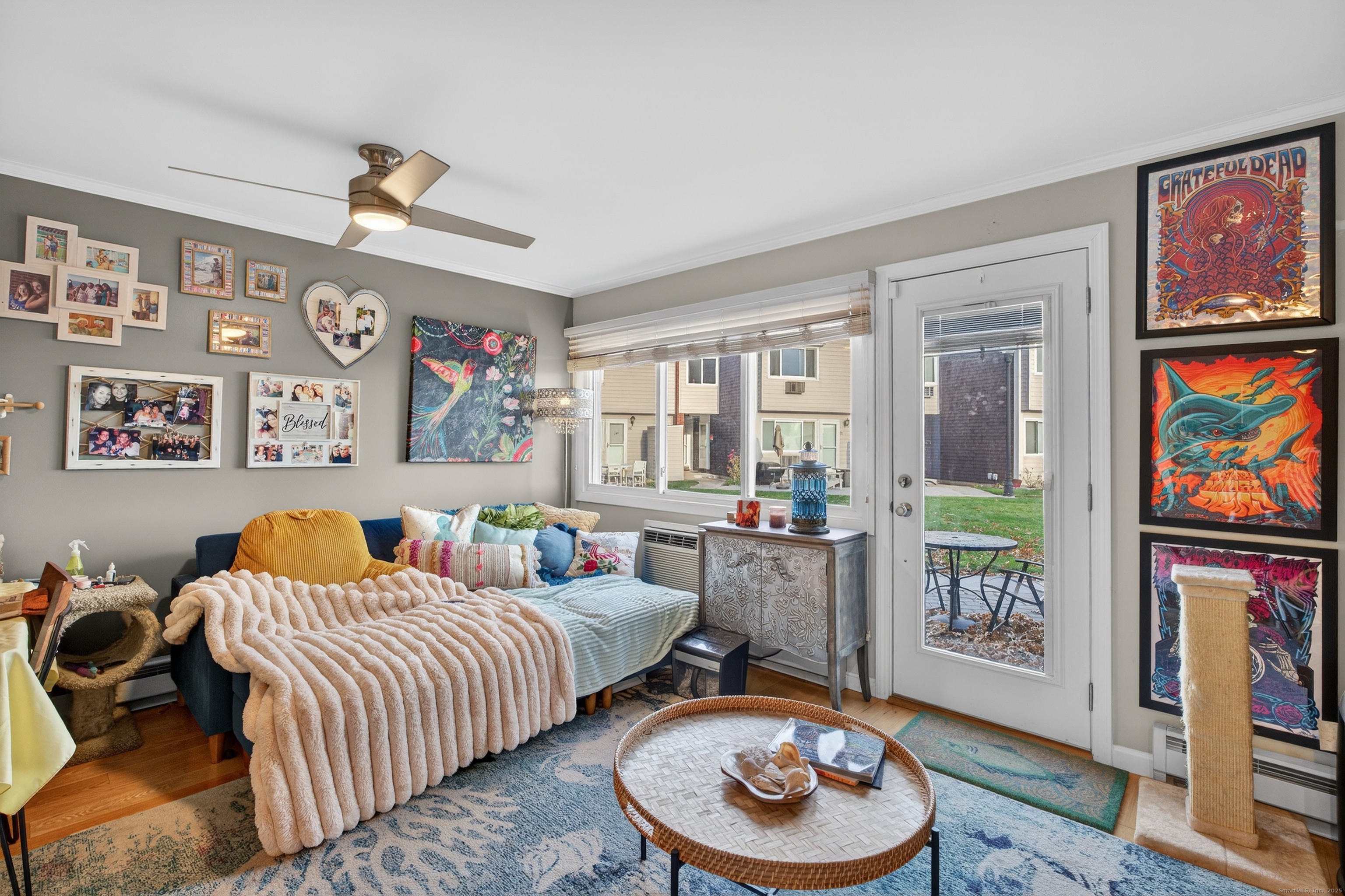 142 W Walk, Unit 142 West Haven, CT 06516 - Photo 11 of 22 a bedroom with bed and a flat screen tv