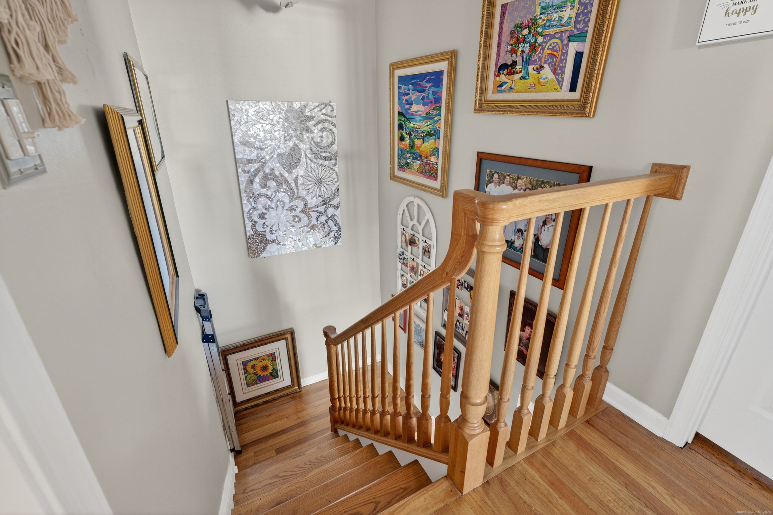 142 W Walk, Unit 142 West Haven, CT 06516 - Photo 13 of 22 a view of entryway with stairs and wooden floor