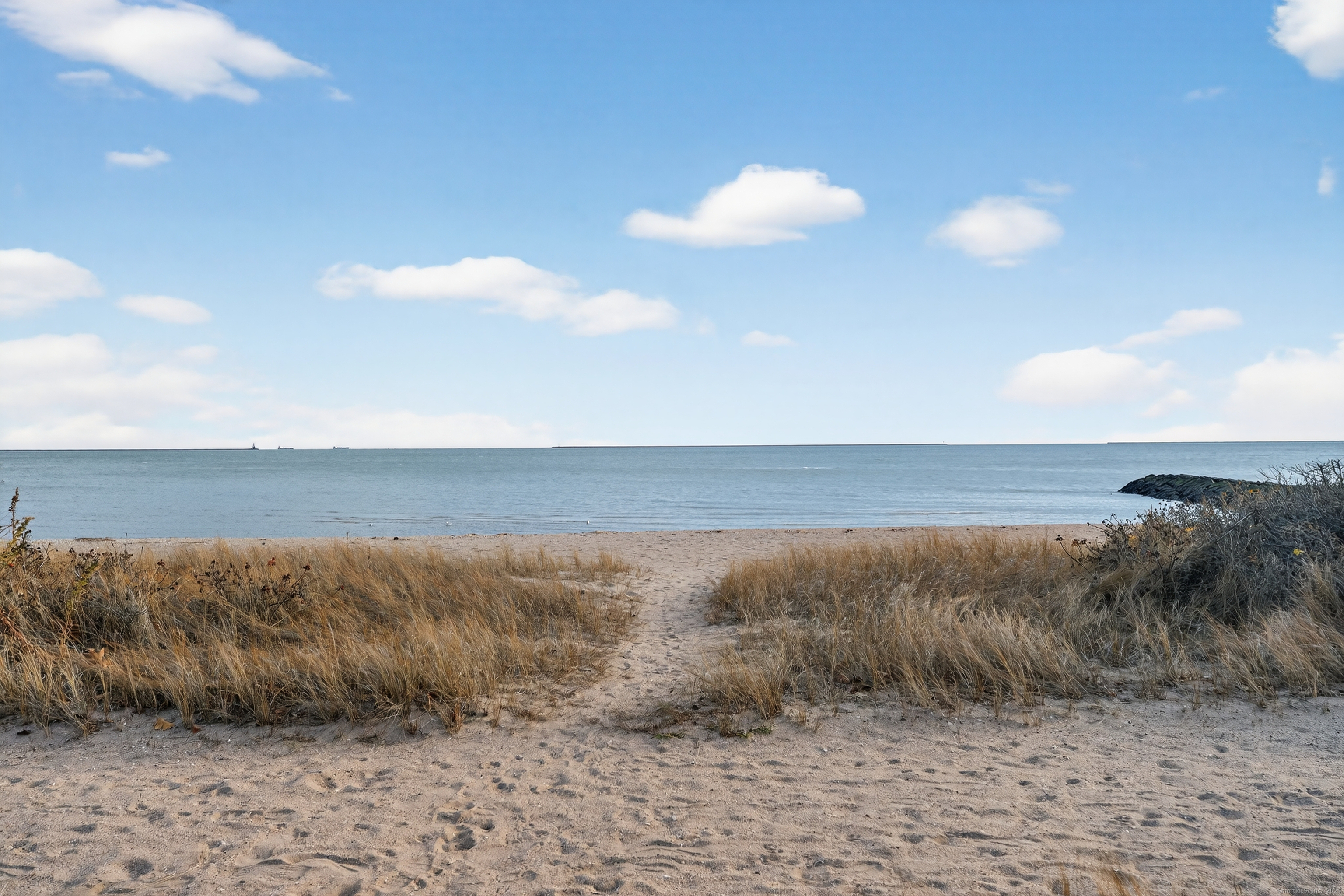 142 W Walk, Unit 142 West Haven, CT 06516 - Photo 18 of 22 a view of an ocean