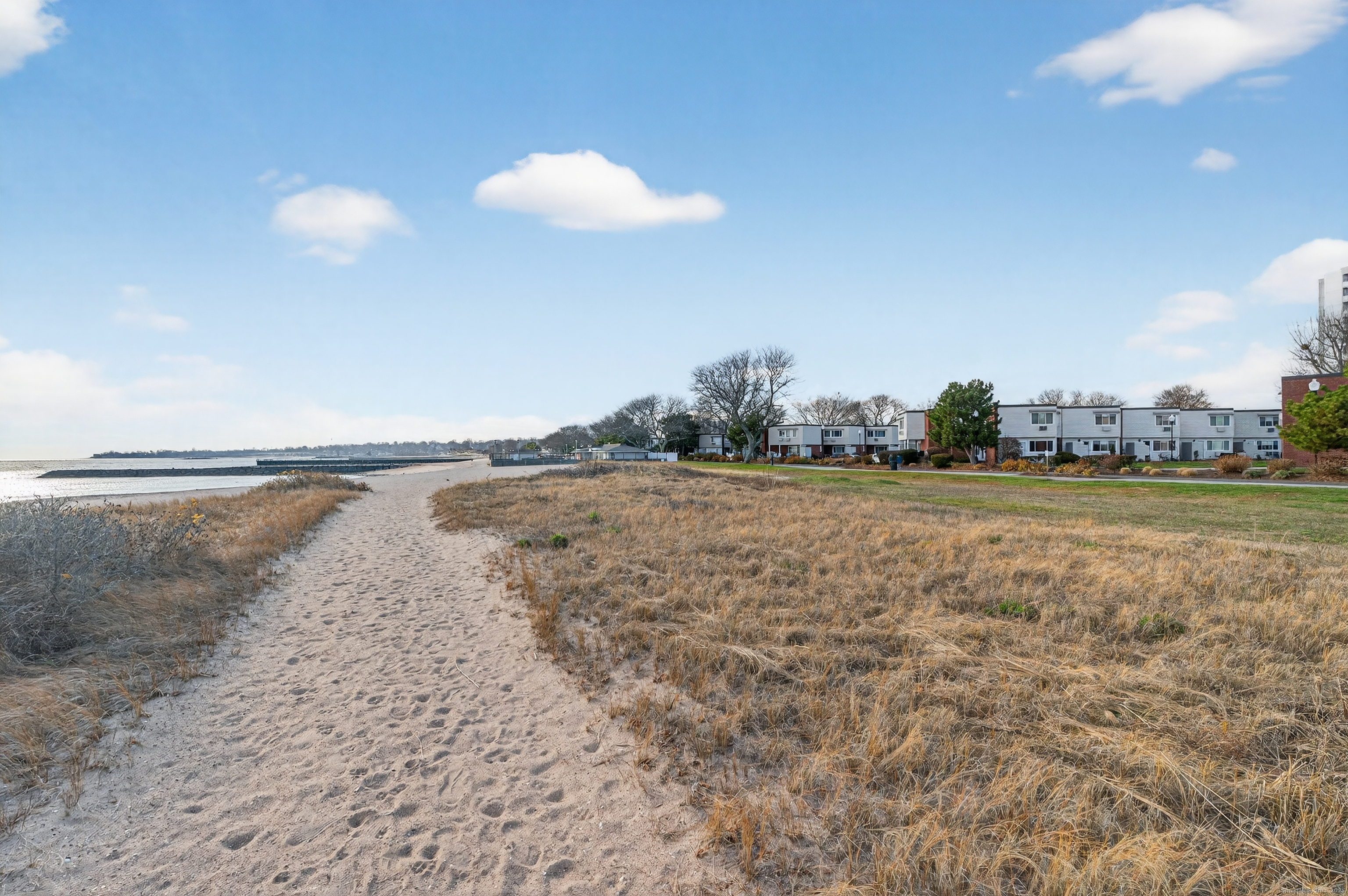 142 W Walk, Unit 142 West Haven, CT 06516 - Photo 20 of 22 a view of an ocean and beach