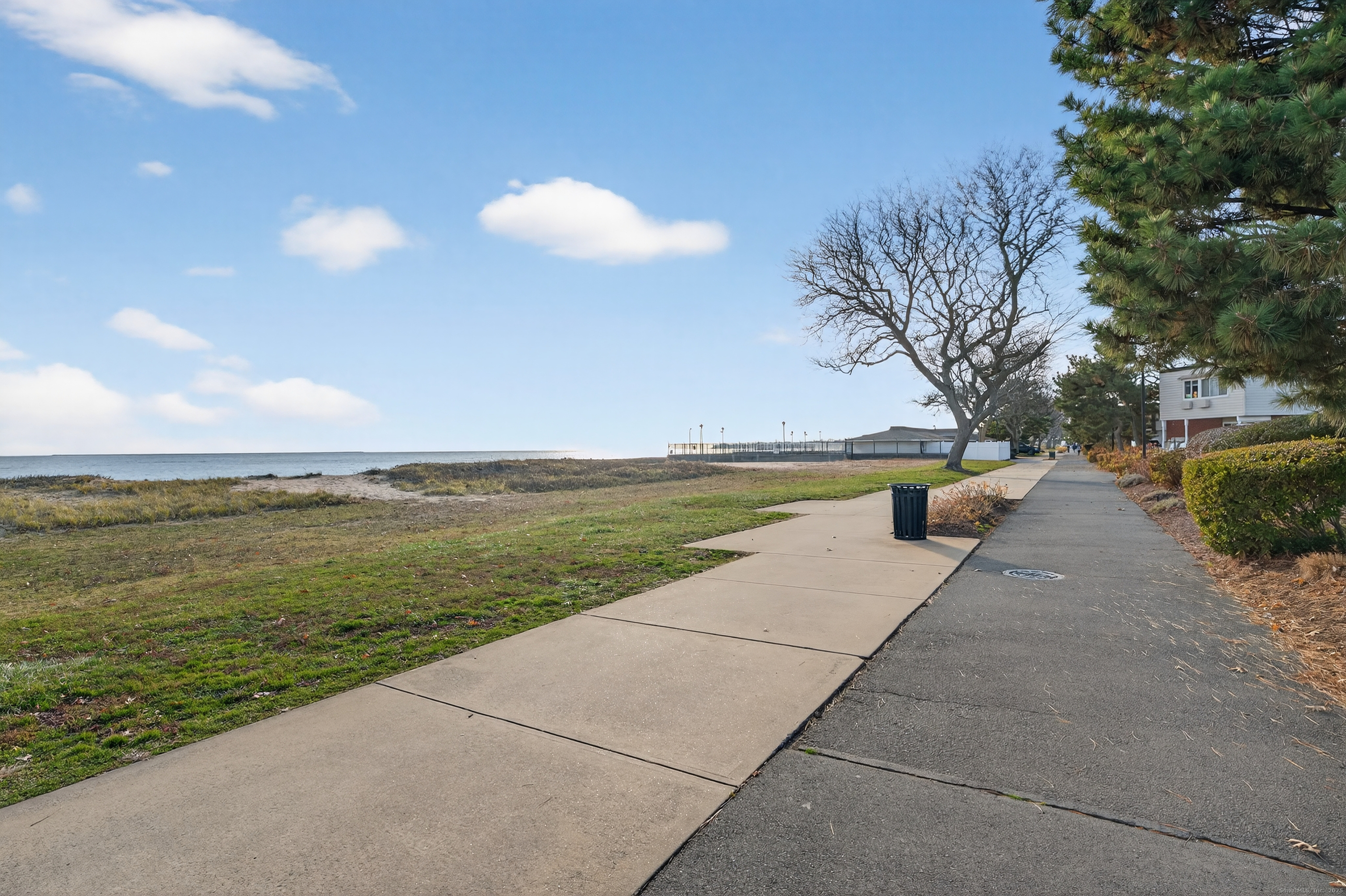 142 W Walk, Unit 142 West Haven, CT 06516 - Photo 22 of 22 a view of an ocean and beach