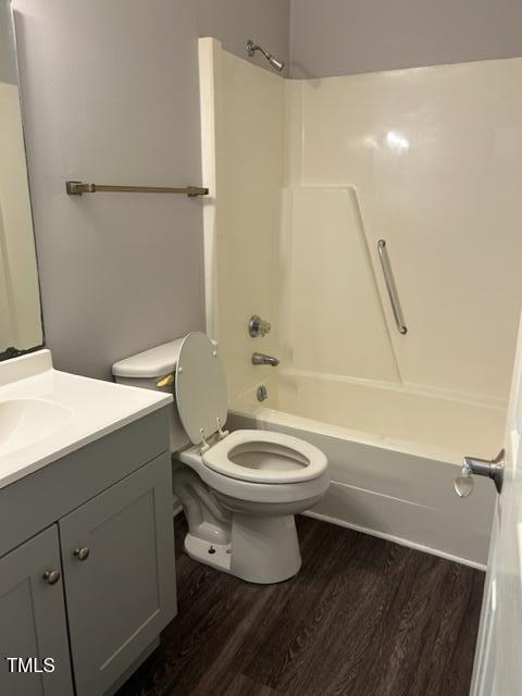 4604 Lavista Court, Unit A & B Raleigh, NC 27616 - Photo 13 of 33 a bathroom with a toilet a sink and a shower