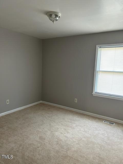 4604 Lavista Court, Unit A & B Raleigh, NC 27616 - Photo 14 of 33 an empty room with a window