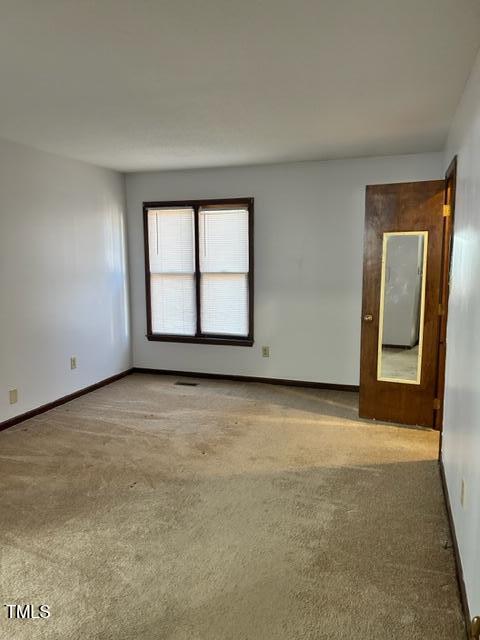 4604 Lavista Court, Unit A & B Raleigh, NC 27616 - Photo 20 of 33 an empty room with a window