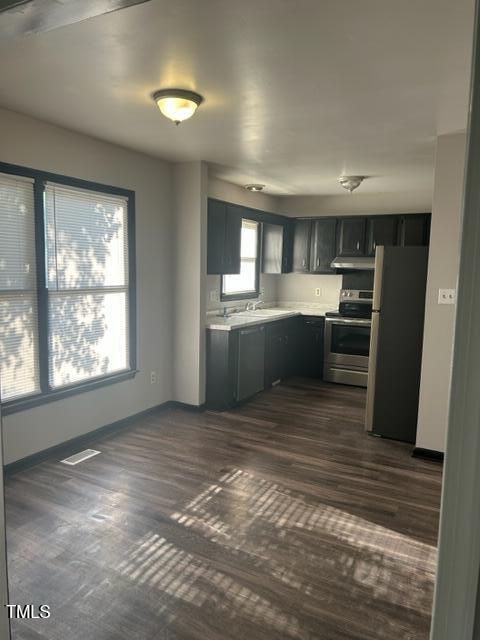 4604 Lavista Court, Unit A & B Raleigh, NC 27616 - Photo 2 of 33 a view of kitchen with sink oven and cabinets