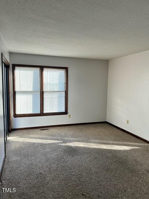 4604 Lavista Court, Unit A & B Raleigh, NC 27616 - Photo 21 of 33 an empty room with windows