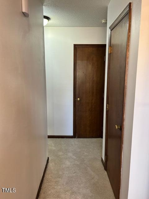 4604 Lavista Court, Unit A & B Raleigh, NC 27616 - Photo 27 of 33 a view of an empty room with wooden floor