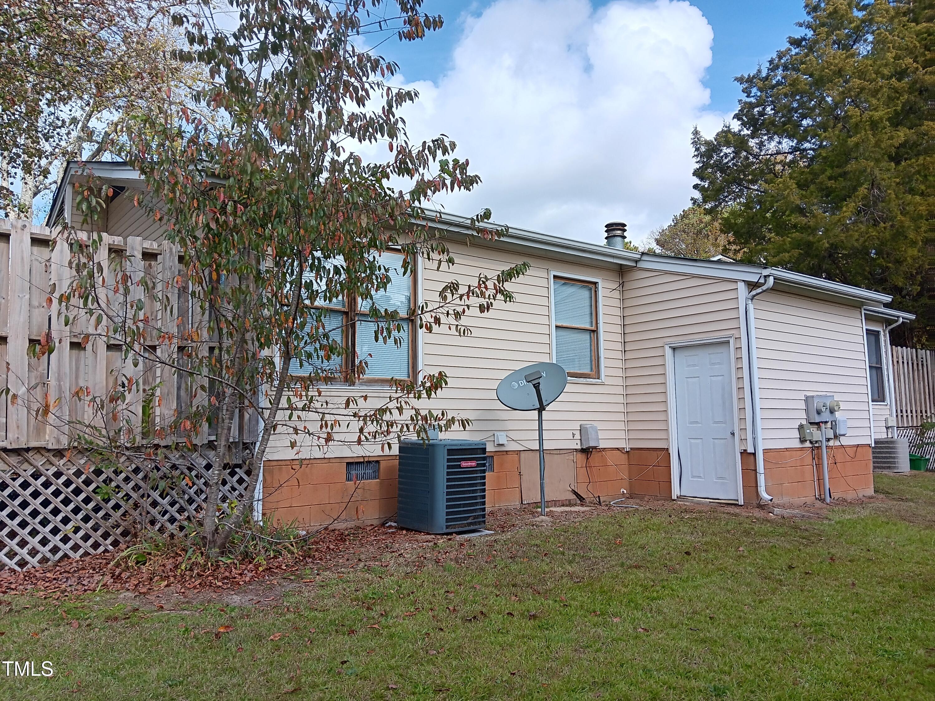 4604 Lavista Court, Unit A & B Raleigh, NC 27616 - Photo 33 of 33 a front view of house with a garden