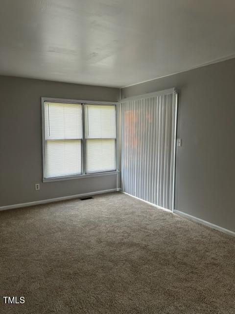 4604 Lavista Court, Unit A & B Raleigh, NC 27616 - Photo 8 of 33 an empty room with a window