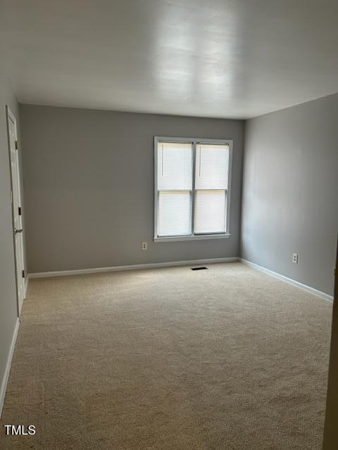 4604 Lavista Court, Unit A & B Raleigh, NC 27616 - Photo 10 of 33 an empty room with a empty space and windows
