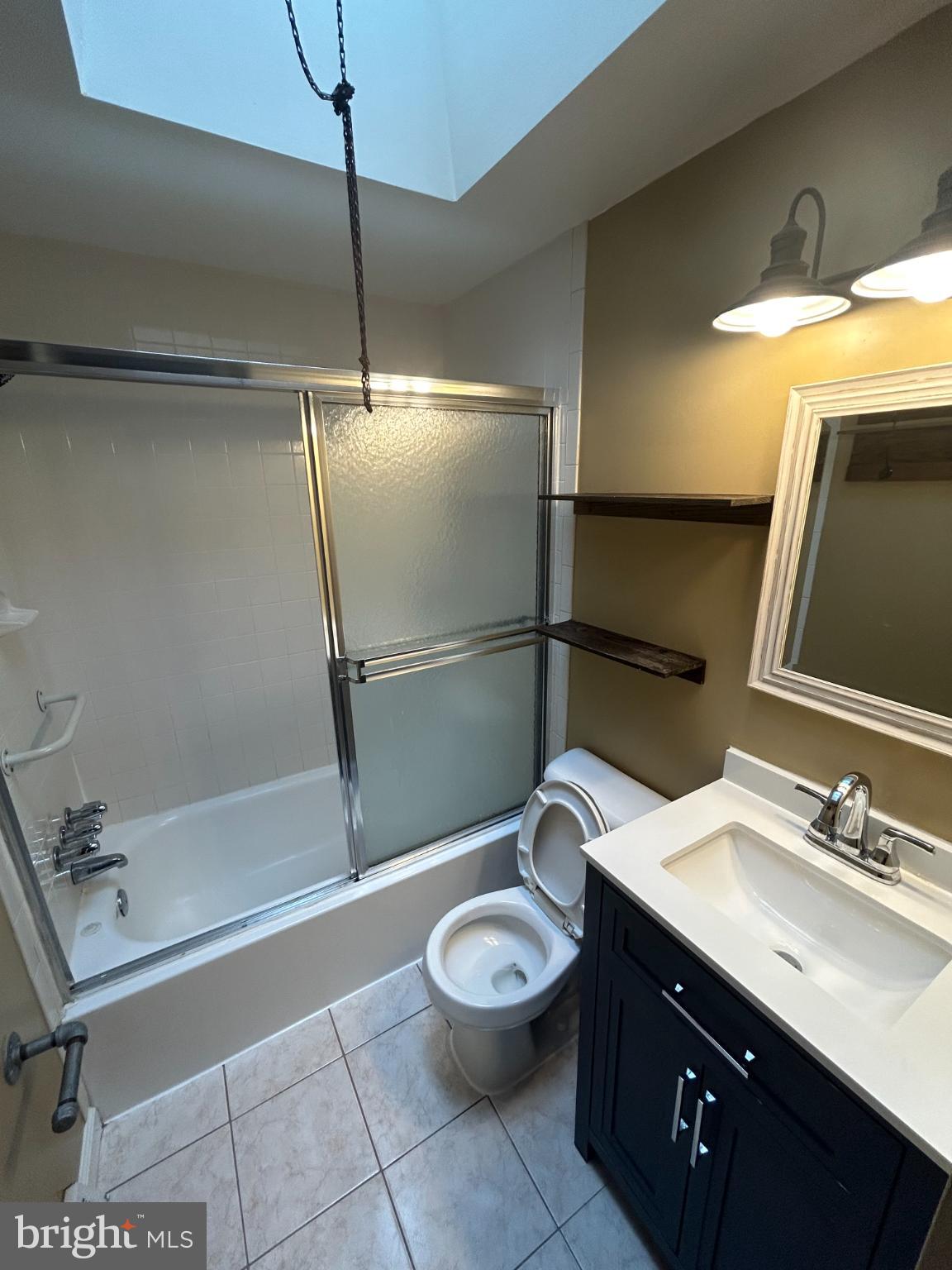 10830 Perrin Road Philadelphia, PA 19154 - Photo 15 of 26 a bathroom with a sink and a mirror