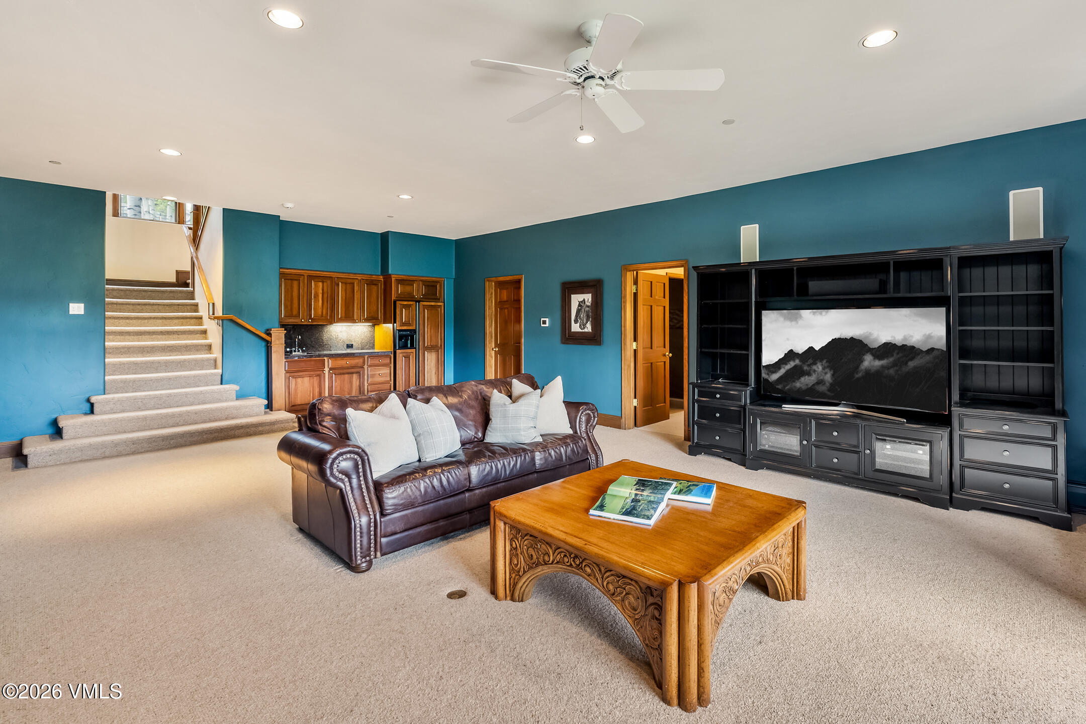 167 Saddle Ridge Edwards, CO 81632 - Photo 32 of 41 a living room with furniture and a flat screen tv