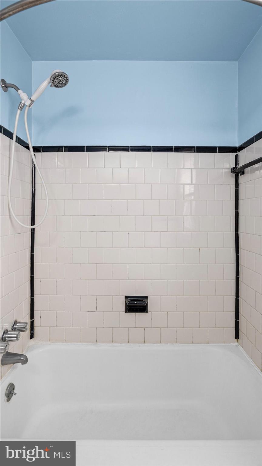 1821 Weyburn Road Baltimore, MD 21237 - Photo 18 of 45 a bathroom with a shower