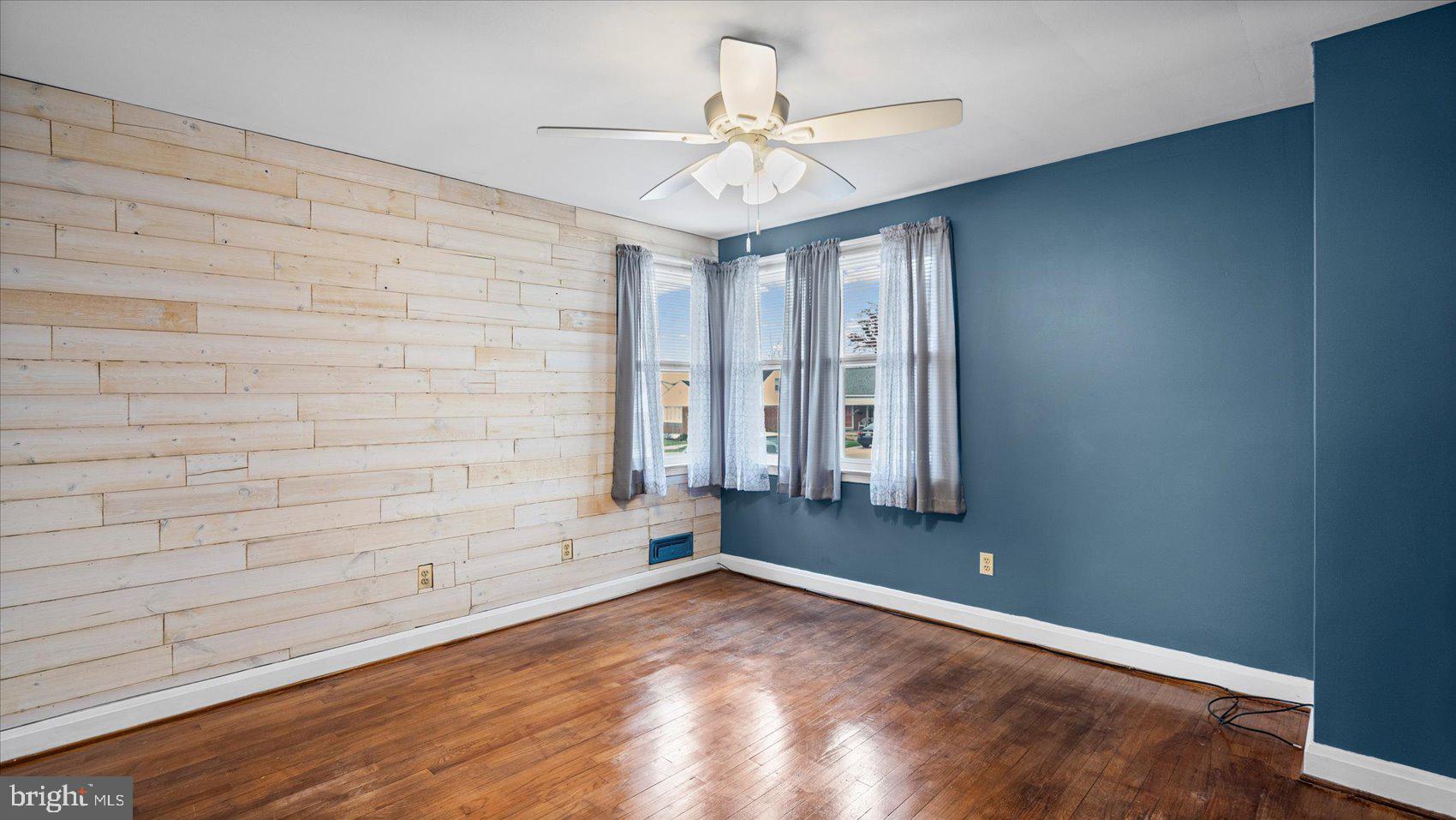 1821 Weyburn Road Baltimore, MD 21237 - Photo 19 of 45 a view of an empty room with a window