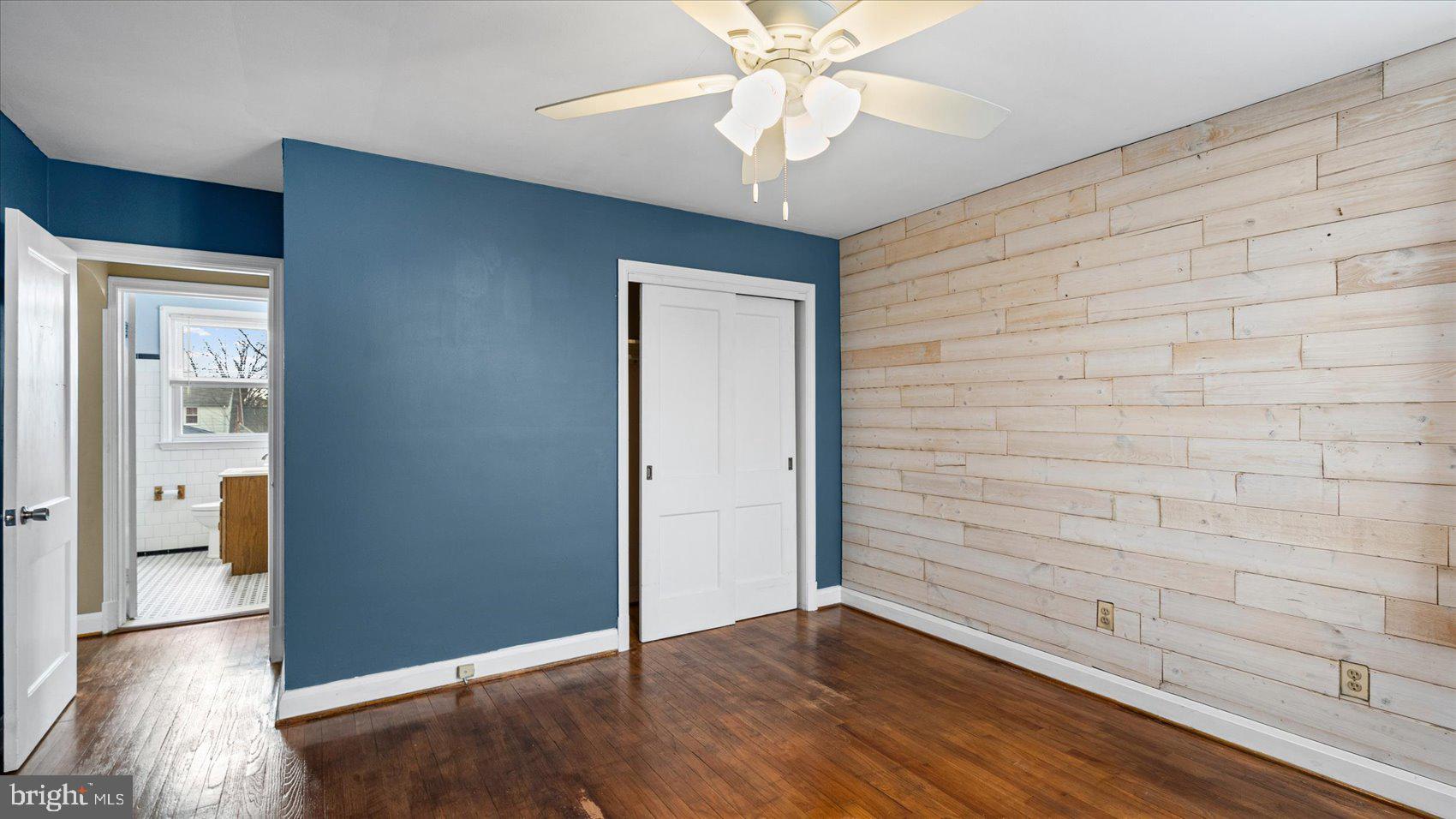 1821 Weyburn Road Baltimore, MD 21237 - Photo 20 of 45 a view of an empty room with wooden floor