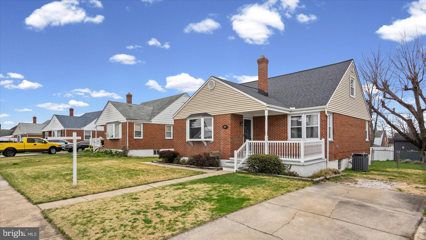 1821 Weyburn Road Baltimore, MD 21237 - Photo 2 of 45 a front view of a house with garden