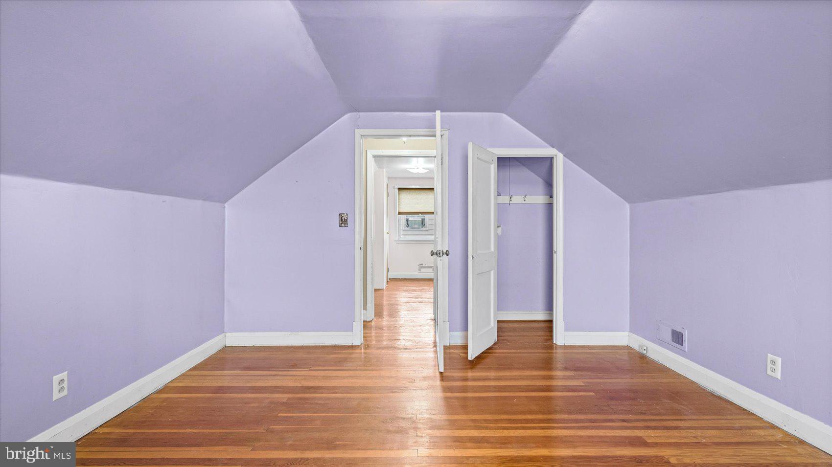 1821 Weyburn Road Baltimore, MD 21237 - Photo 23 of 45 a view of an empty room with wooden floor