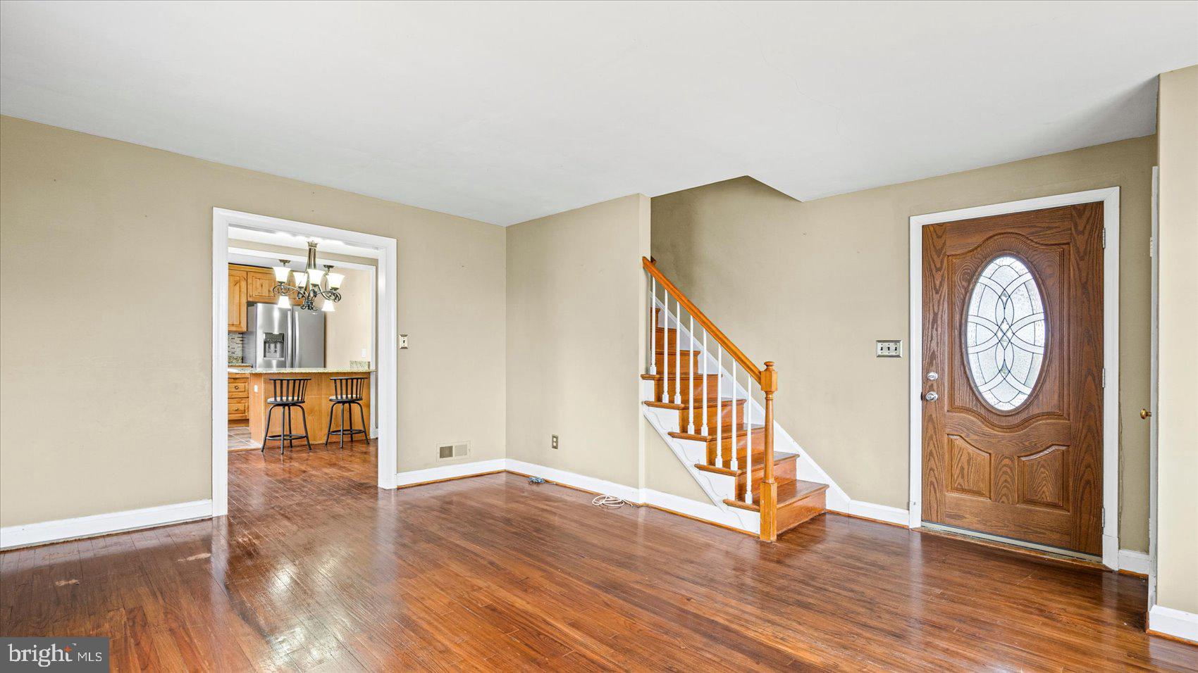 1821 Weyburn Road Baltimore, MD 21237 - Photo 4 of 45 a view of an entryway with wooden floor