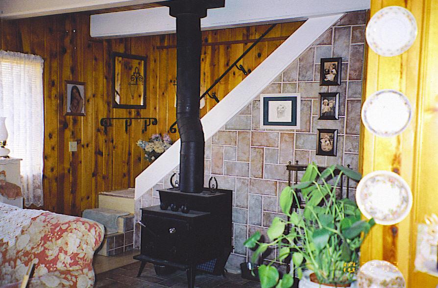 29475 Pne Spgs Lane Whitmore, CA 96096 - Photo 6 of 7 a living room with couches painting and a potted plant