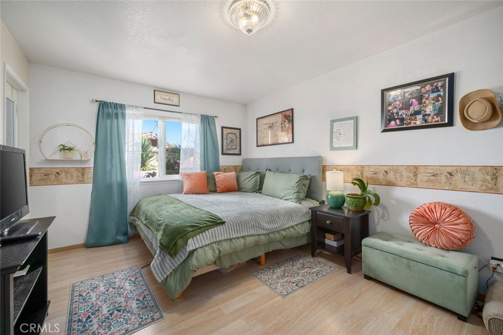 1480 Island Court Oceano, CA 93445 - Photo 12 of 31 a bedroom with a bed and a couch