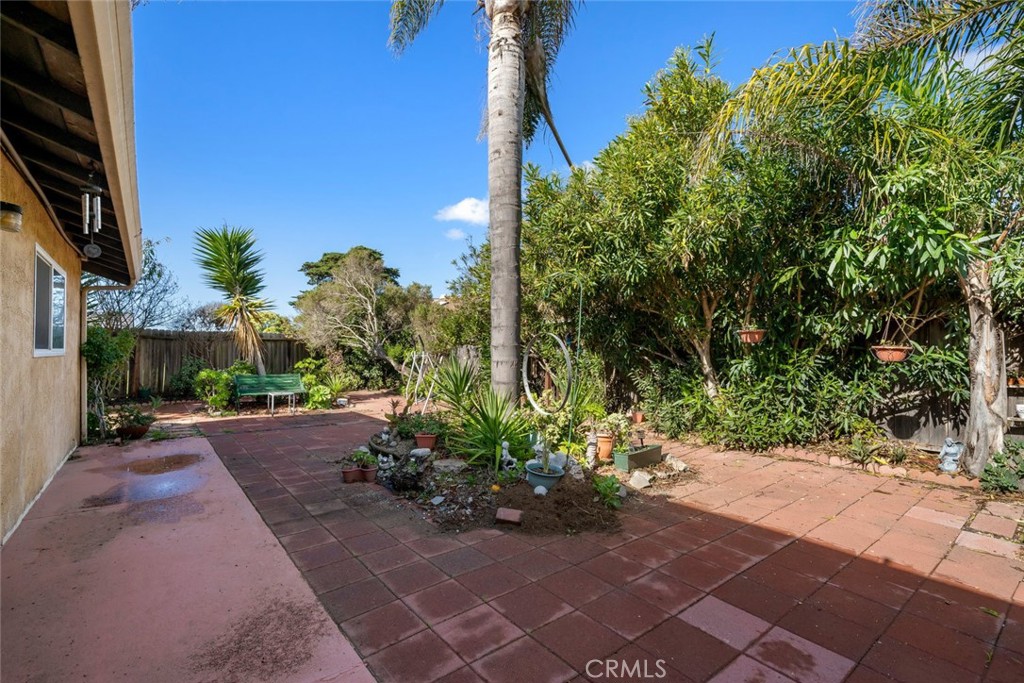 1480 Island Court Oceano, CA 93445 - Photo 29 of 31 a view of a street with potted plants and large trees
