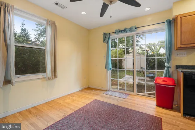 a kitchen with a refrigerator sink and stove
