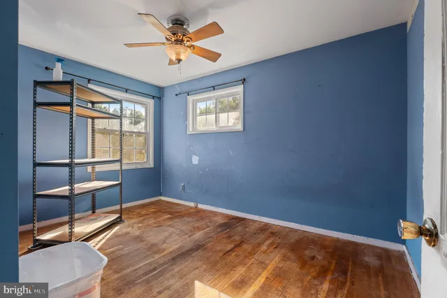 a view of a bedroom from a hallway
