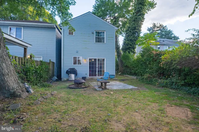 a backyard of a house with seating space