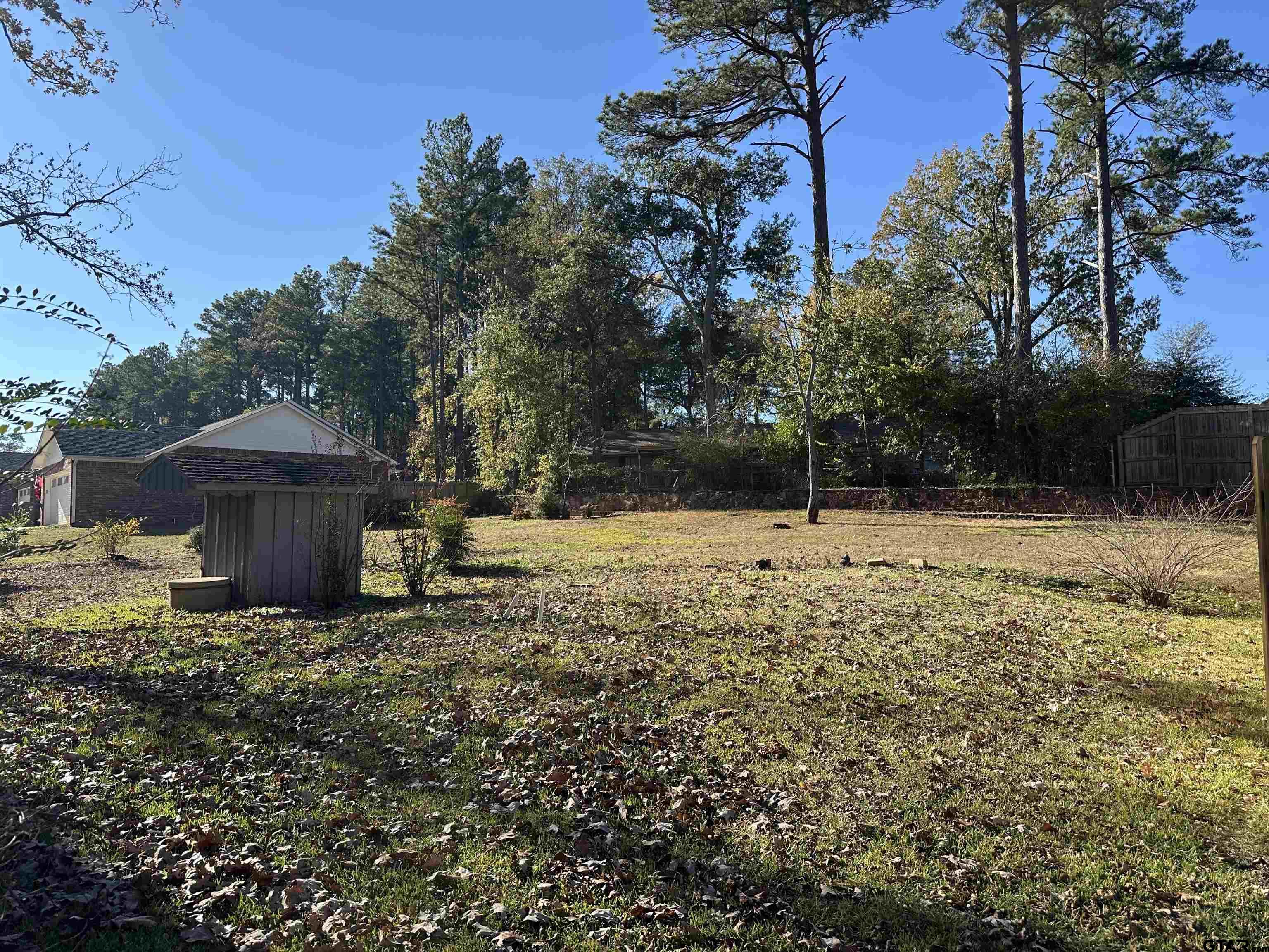 Tbd Robertson Avenue Tyler, TX 75701 - Photo 5 of 9 a house with trees in front of it