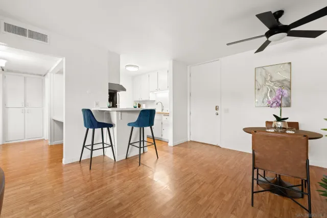 a workspace with furniture and wooden floor