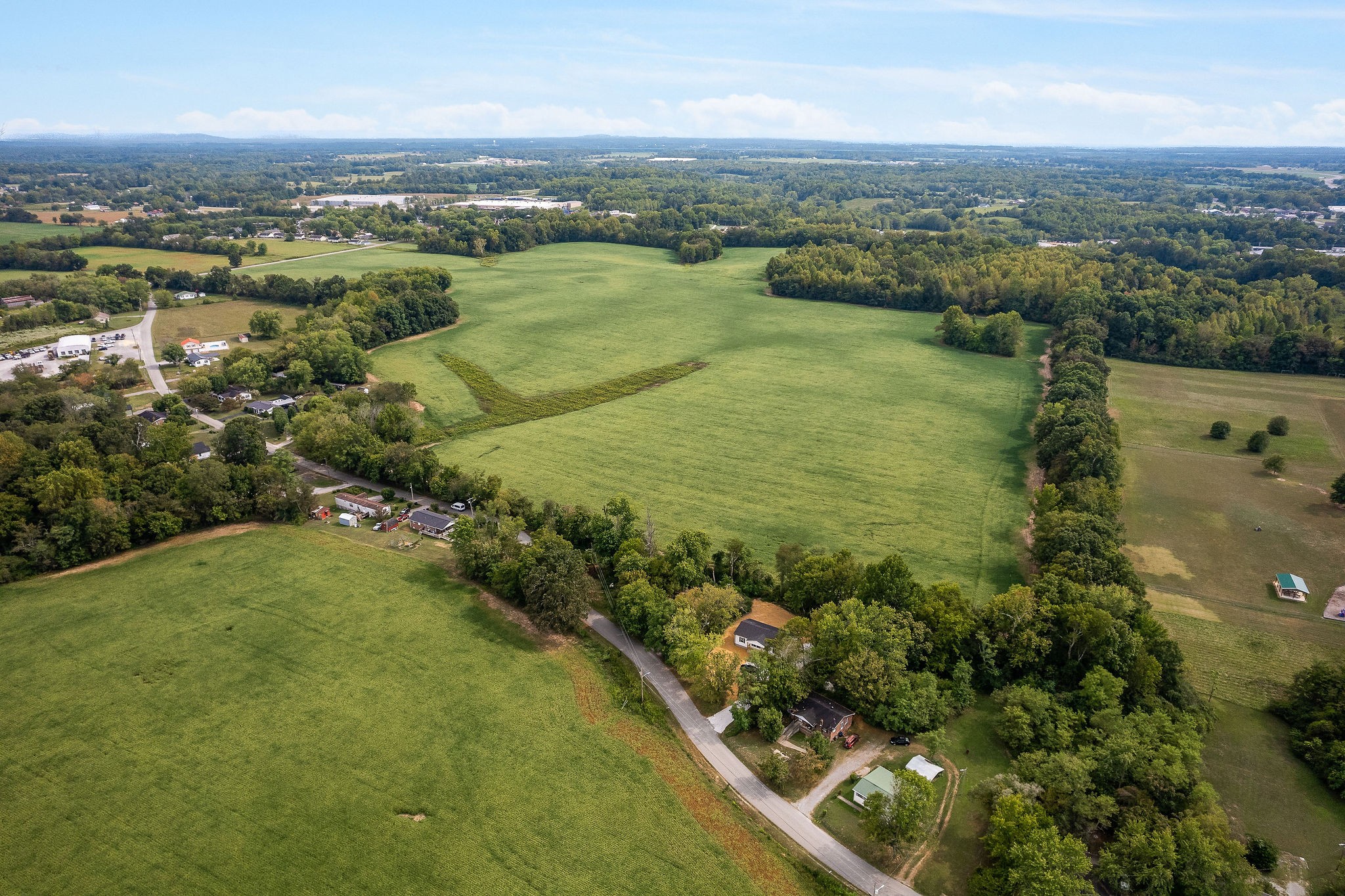 0 East Main Street Smithville, TN 37166 - Photo 10 of 22 an aerial view of residential houses with outdoor space and trees
