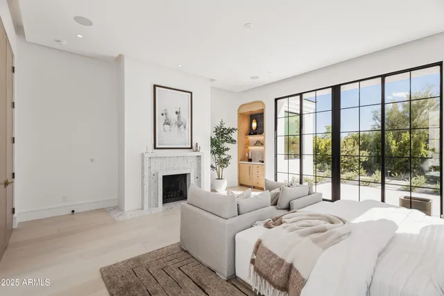 a view of a dining room with furniture and window