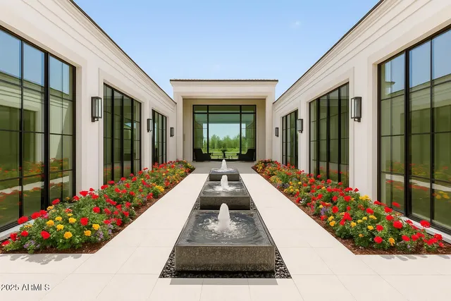 a view of potted plants next to a yard