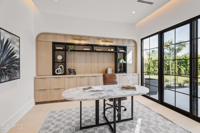 a bathroom with a granite countertop sink toilet a mirror and shower