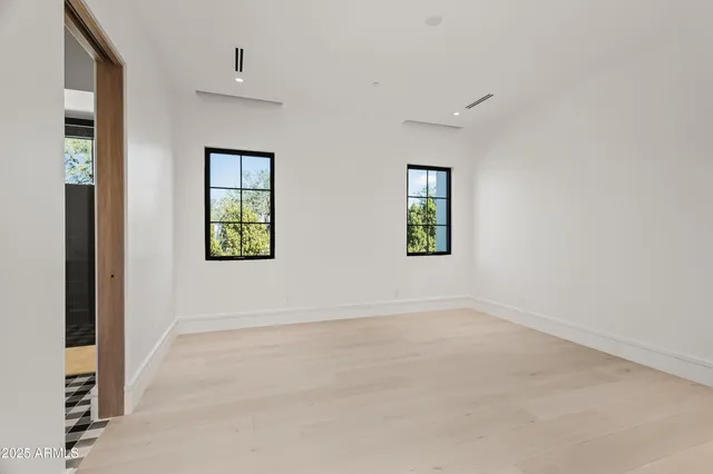 an empty room with windows