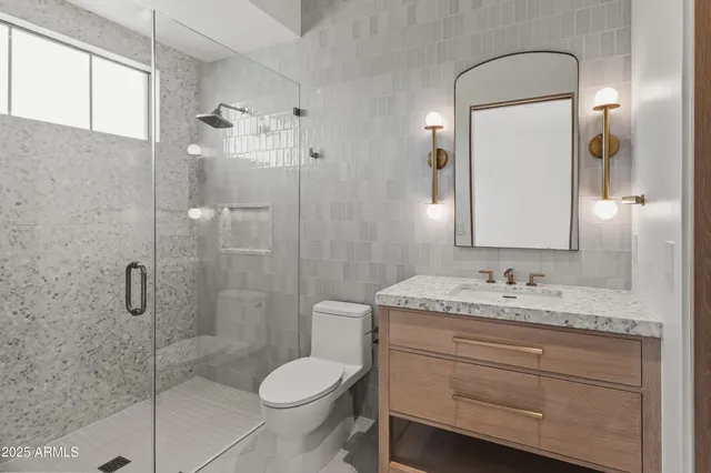 a view of a house with a porch and furniture