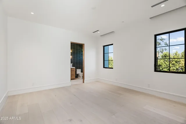 a view of a house with backyard and porch