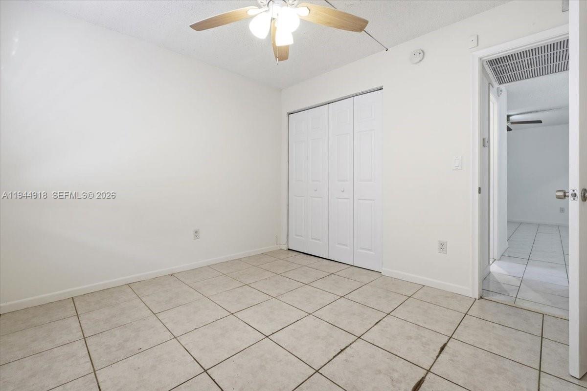 14861 Southwest 104th Street, Unit 2813 Miami, FL 33196 - Photo 15 of 21 a view of an empty room