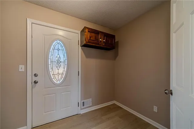 a view of a hallway with elevator