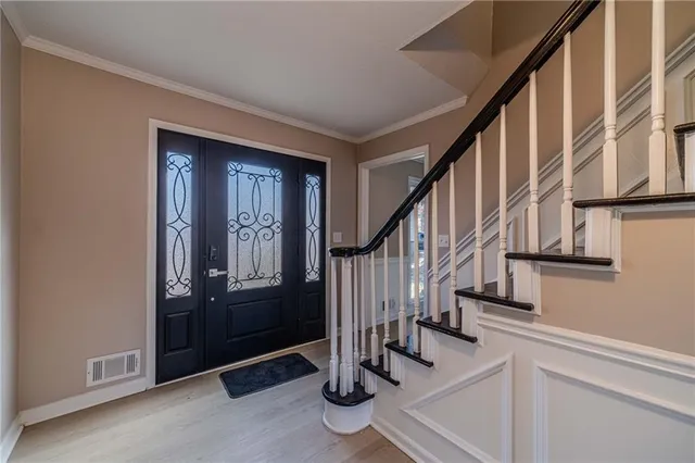 a view of front door with hallway