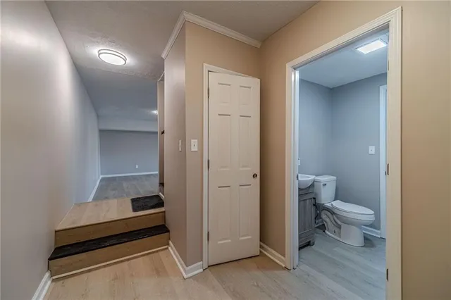 a bathroom with a sink and a toilet