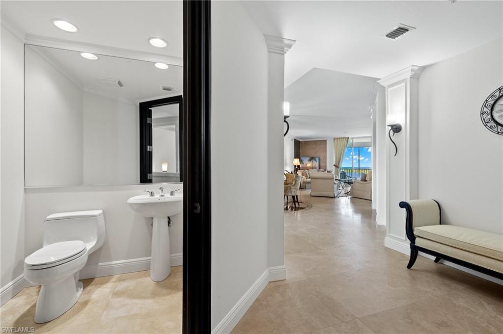 285 Grande Way, Unit 705 Naples, FL 34110 - Photo 25 of 44 Powder room off foyer