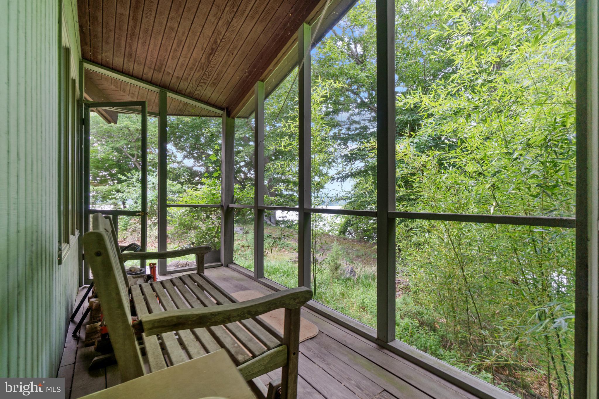 12211 Riverview Road Fort Washington, MD 20744 - Photo 28 of 45 screened porch off primary bedroom